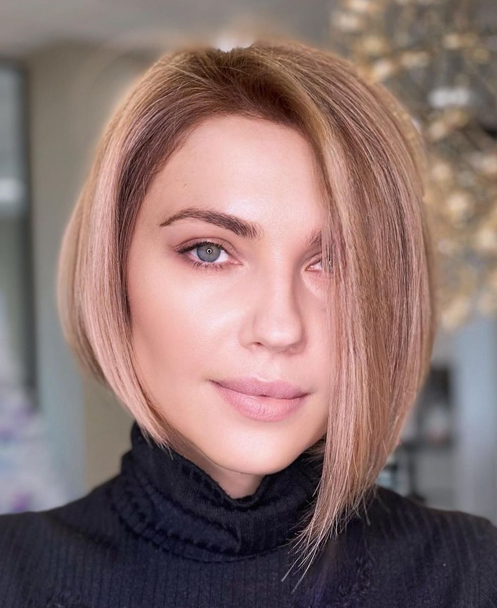 Sleek Asymmetrical Bob for an Oval Face